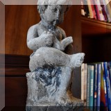 D24. Concrete cherub. 